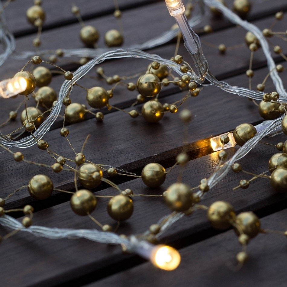 Lichterkette - batteriebetrieben - goldene Perlen, warmweiß, 10 Dioden, 1,3 m